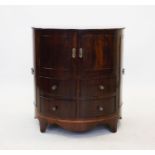 A George III bow front side cabinet, with a pair of central convex cupboard doors above four