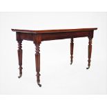 A 19th century mahogany side table, the rectangular top raised upon lobed and ring turned legs