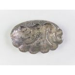 An Egyptian silver dish, Cairo 1965-67, designed with stylized silver fish motif, a part scalloped