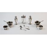 A selection of 19th century and later silver condiment items to include, a Victorian pair of