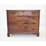 A George III mahogany chest of drawers, the rectangular moulded top above three short and three long