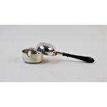 A silver tea strainer and stand, Adie Brothers Ltd, Birmingham 1955, of typical form, the bowl