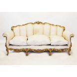 A French Louis XVI style five piece gilt wood salon suite, mid 20th century, the settee with a swept