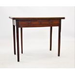 A George III mahogany folding tea table, the rectangular moulded top above two frieze drawers,