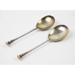 Two George V silver seal top spoons, Stuart Clifford & Co, London 1920-1921, with plain polished