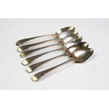 A set of six George III old English pattern silver table spoons, William Stroud, London 1783, with