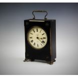 An early 20th century French ebonised mantel clock, with a 12cm glazed white dial, external hands,