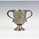 A George III silver loving cup, Thomas Watson, Newcastle 1815, of plain polished form, with banded