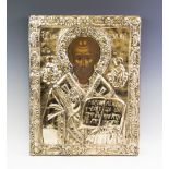 A continental Orthodox devotional icon, early 20th century and later, depicting John the Evangelist,