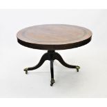 A 19th century rosewood centre table, the circular table top with a cross banded coromandel