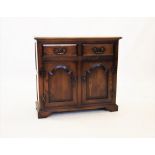 A George III style stained ash dresser base by Sitting Firm, late 20th century, the rectangular