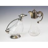 An Edwardian silver mounted claret jug, Birmingham 1910, the fittings with plain polished finish,