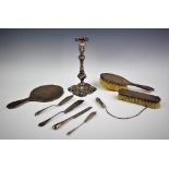 A silver backed dressing table set, Henry Matthews, Birmingham 1924, comprising; two brushes and a