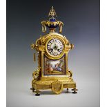 A 19th century French ormolu and porcelain panel mantel clock with Japy Freres movement, the gilt