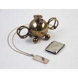 An Edwardian silver table lighter, Joseph Braham, London 1902, of spherical form, with circular