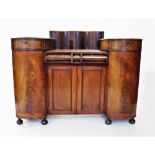 A 19th century and later reconstructed mahogany sideboard, with an Art Deco influence, having a