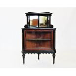 A late Victorian Aesthetic free standing corner cupboard, the ebonised and burr yew cabinet with