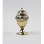 A George IV sugar caster, Thomas Johnson I, London 1824, of baluster form, embossed with scrolling