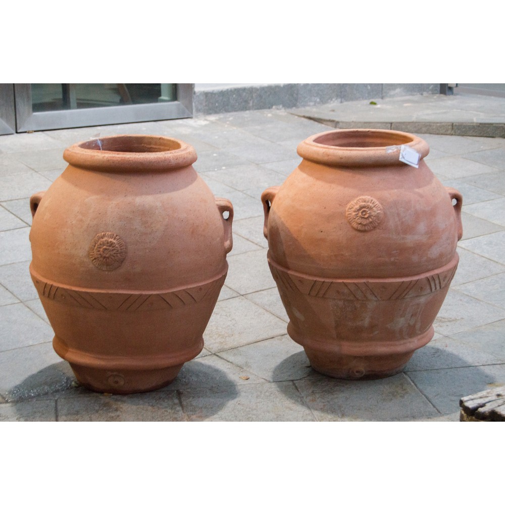 COPPIA ORCI in terracotta. Sicilia XX secolo Misure: h cm 64