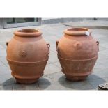 COPPIA ORCI in terracotta. Sicilia XX secolo Misure: h cm 64