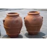 COPPIA ORCI in terracotta. Sicilia XX secolo Misure: h cm 64