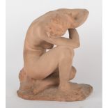 SCULTURA in terracotta raffigurante "Nudo femminile accovacciato". XX secolo Misure: h cm 27