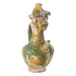 VERSATOIO in ceramica smaltata a guisa di figura maschile. Collesano XIX secolo Misure: h cm 32