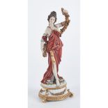 SCULTURA in biscuit Capodimonte policroma raffigurante "Figura femminile" (restauri e lievi
