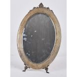 SPECCHIERA ovale da tavolo in legno ed argento. XX secolo Misure: cm 23,5 x 35