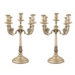 COPPIA CANDELABRI a cinque fiamme in argento (g. 3011). Italia II meta' XX secolo Misure: h cm 41,5