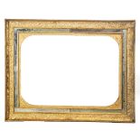CORNICE in legno intagliato e carta oro con inserti di specchi (interno cm 76 x 56). Sicilia XIX