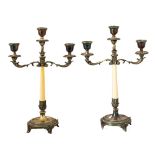 COPPIA CANDELABRI a tre luci in argento con fusto in avorio (peso lordo g. 1118). Sicilia primi '900