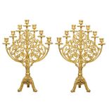 COPPIA CANDELABRI a sette fiamme in legno intagliato e dorato. XX secolo Misure: cm 115 x 42 x h