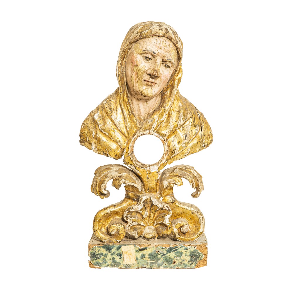 SCULTURA/RELIQUARIO raffigurante "Santa" in legno laccato e dorato ad argento a mecca. Sicilia