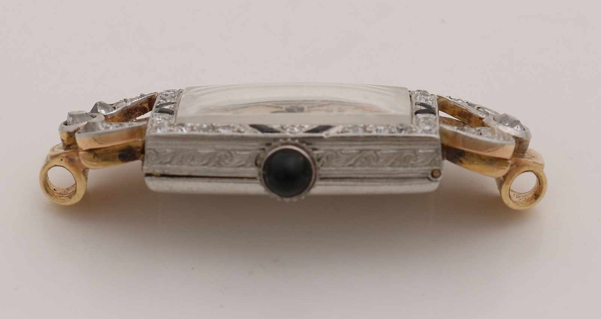 Platinum watch, Art Deco, with gold and among other diamonds and simili stones. Rectangular carved - Image 2 of 3