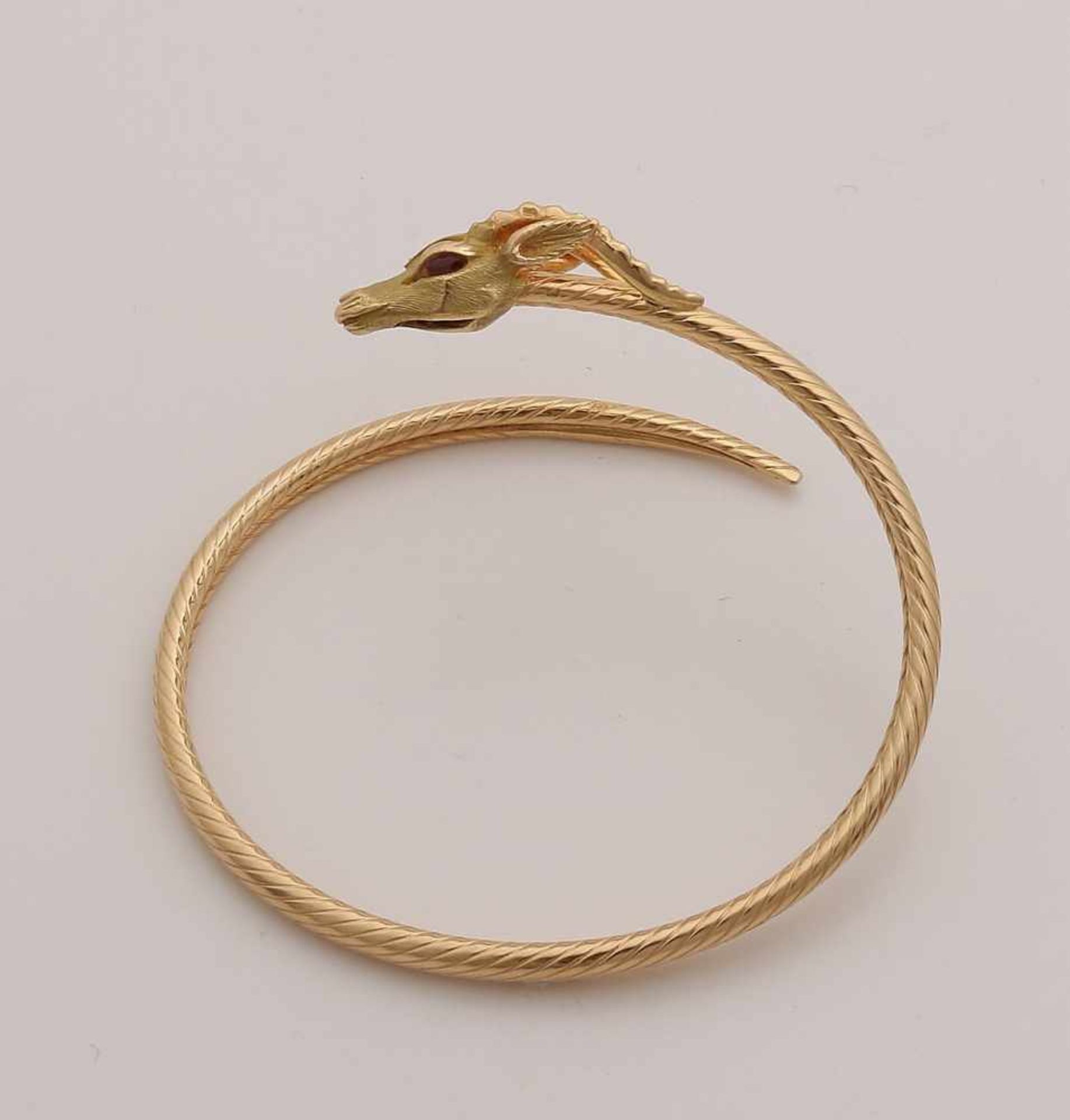 Special yellow gold bracelet, 750/000, with ruby and diamond. Slave band with foxtail pattern, at