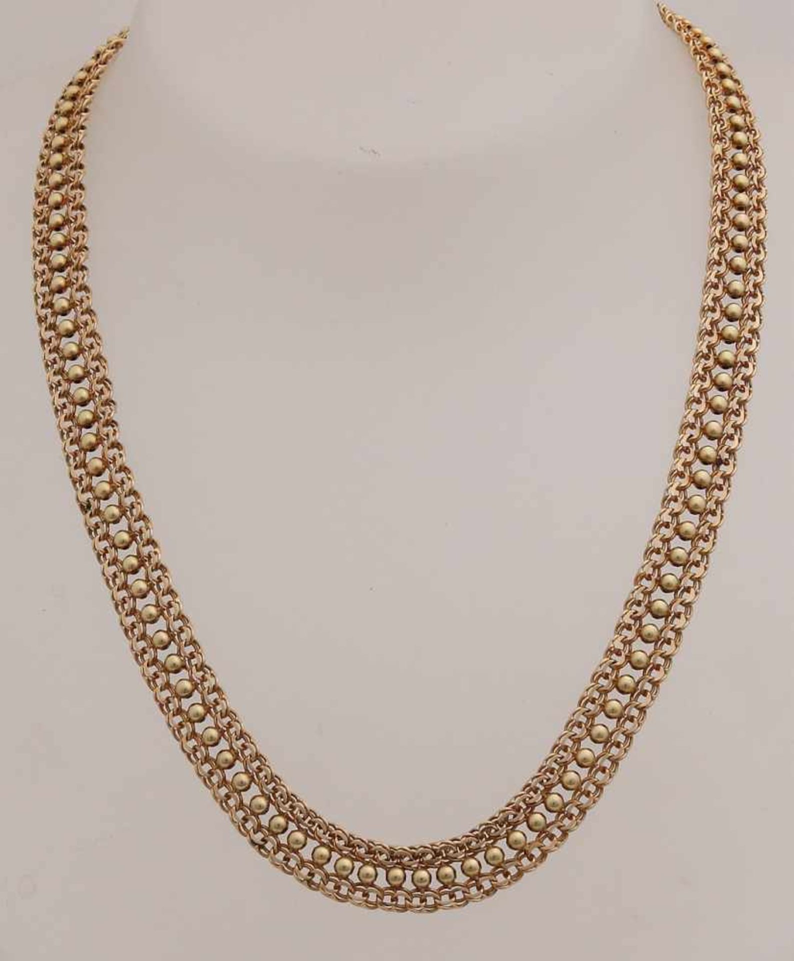 Gold necklace, 585/000, with a Biesmark link in the middle with a row of spheres. width 9 mm, length