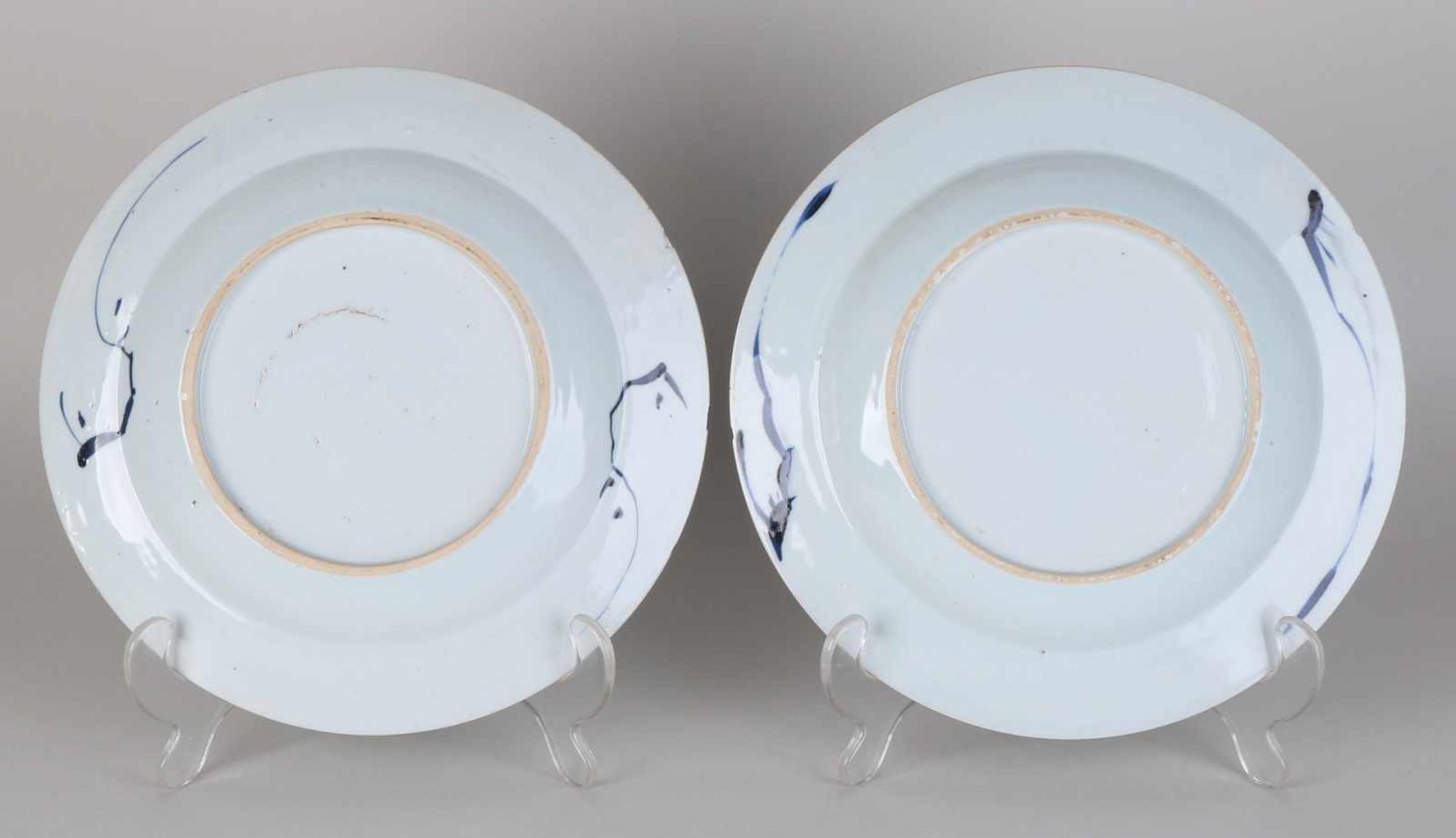 Two 18th century Chinese porcelain plates with garden decor. One plate of hairline + edge damage. - Bild 2 aus 2