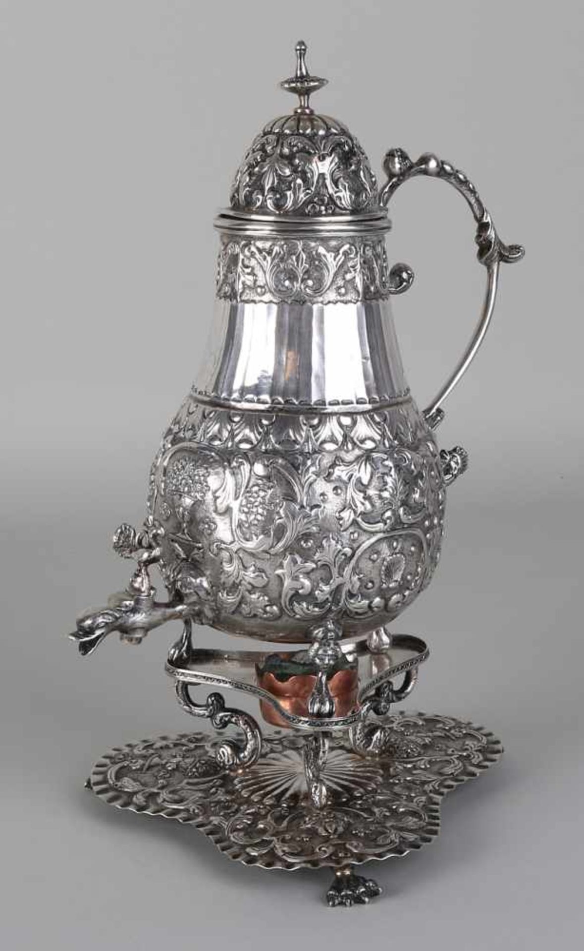 Special Frisian silver tap jug on the stove, 833/000, richly decorated with volutes curls and floral