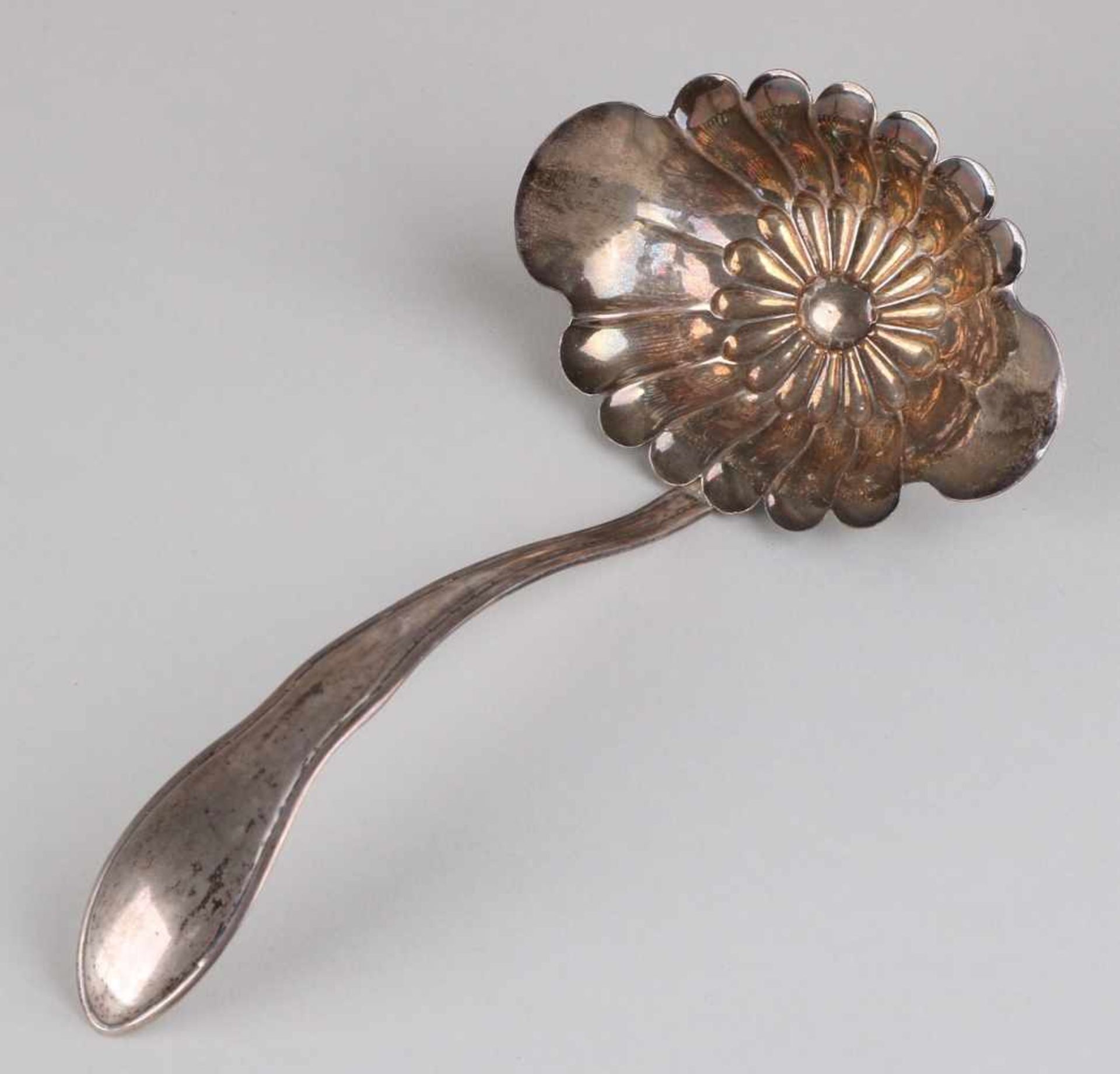 Silver gravy spoon, 833/000, with an oval contoured container attached to a contoured stem with