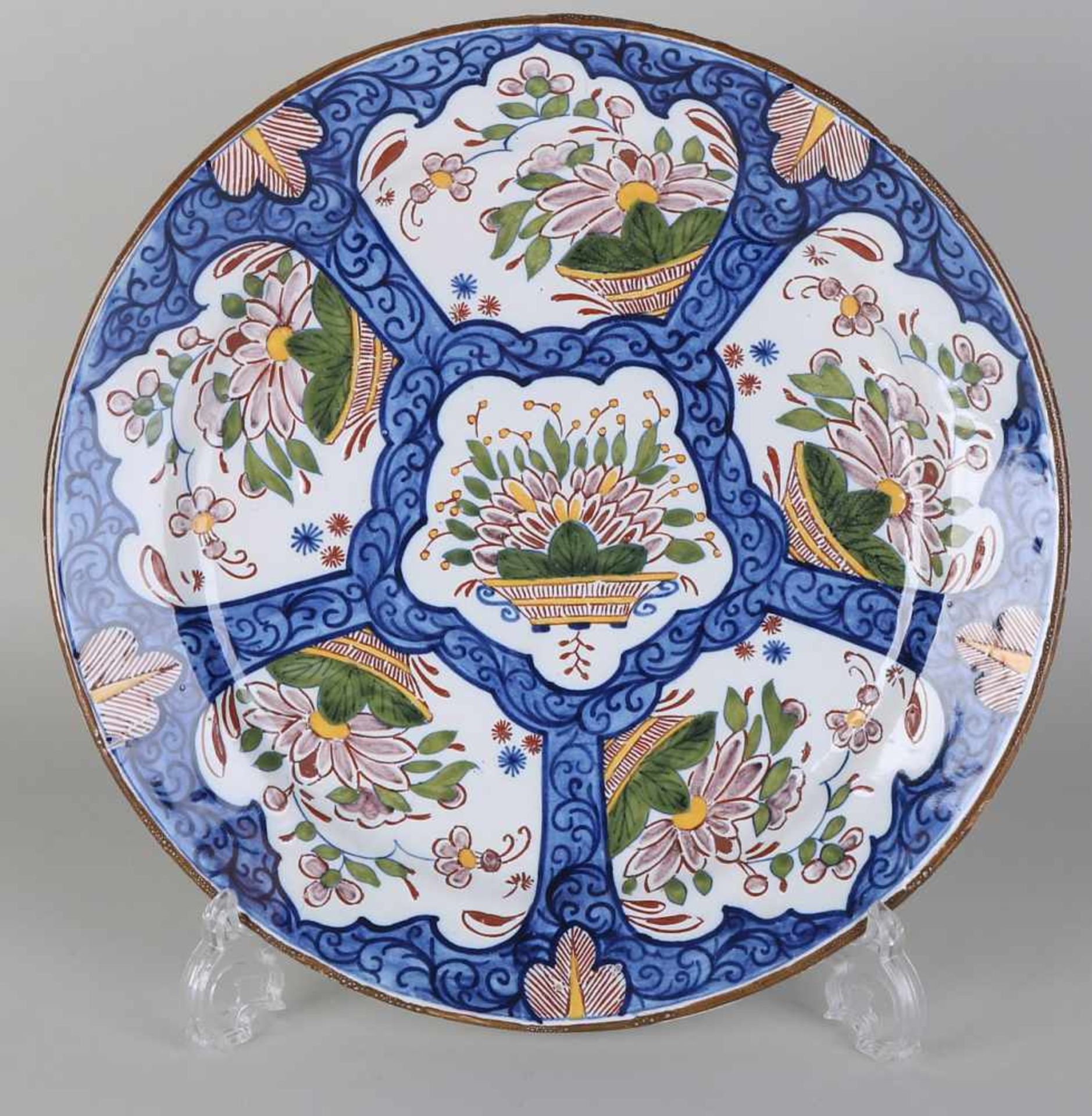 17th - 18th Century polychrome Delft Fayence plate with floral decors. Marked D. Slight edge damage.