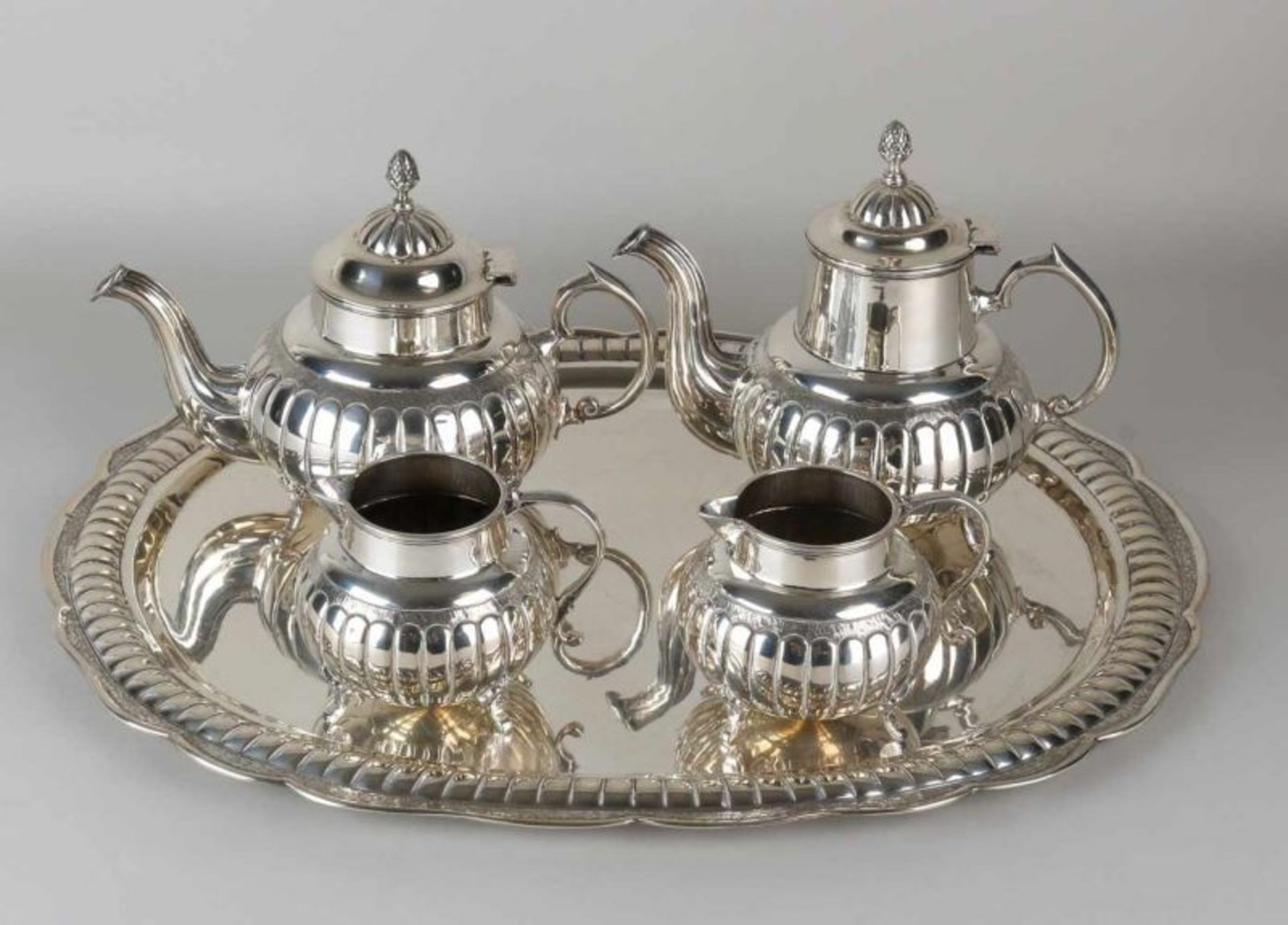 Large silver coffee service, 900/000, with a coffee pot, tea pot and 2 milk jugs placed on an