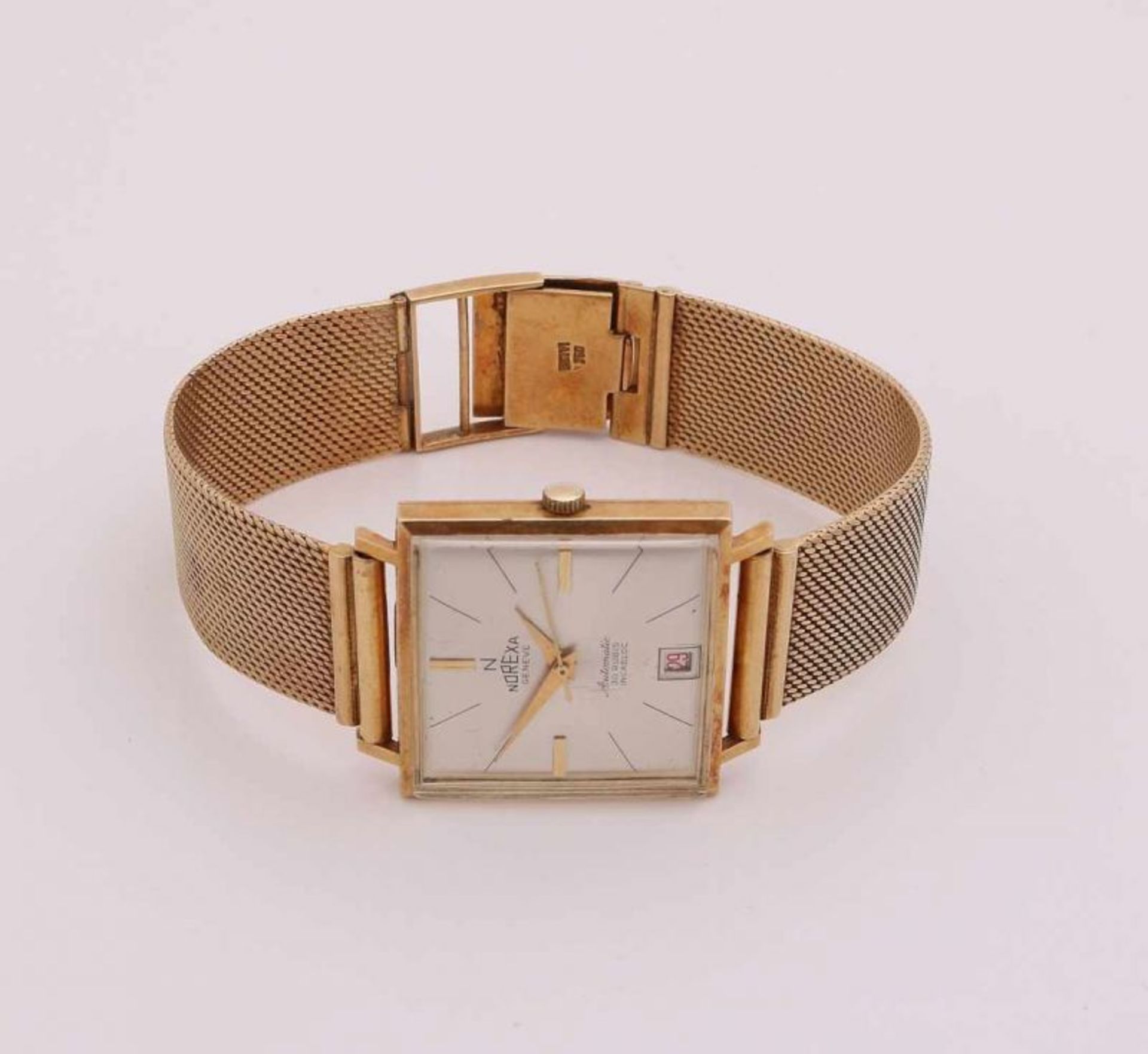 Yellow gold watch, 750/000, Norexa, automatic, with a square case with a date. the watch has a