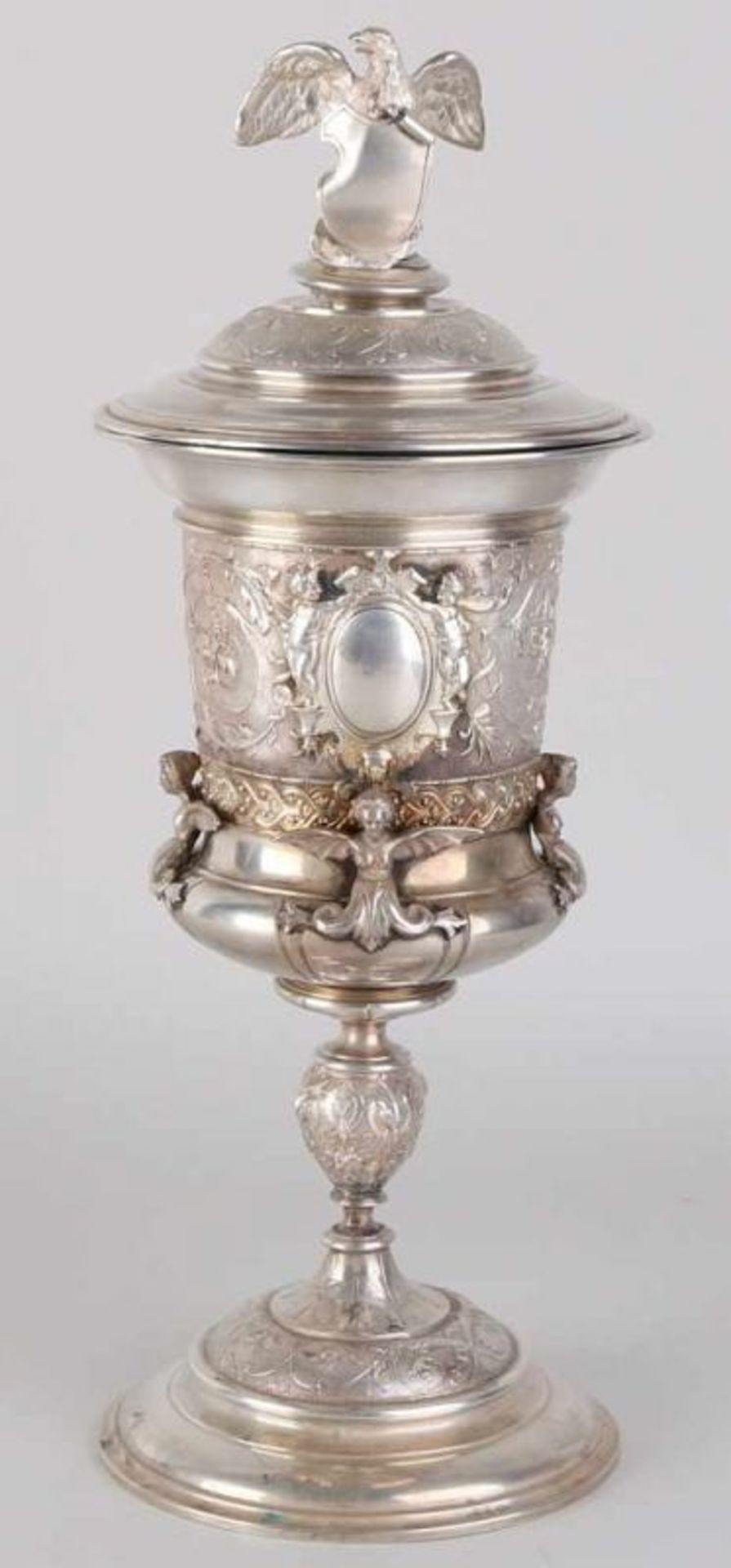 Antique silver show cup, 800/000, with lid. Round cup, decorated with a putti cartouche, four