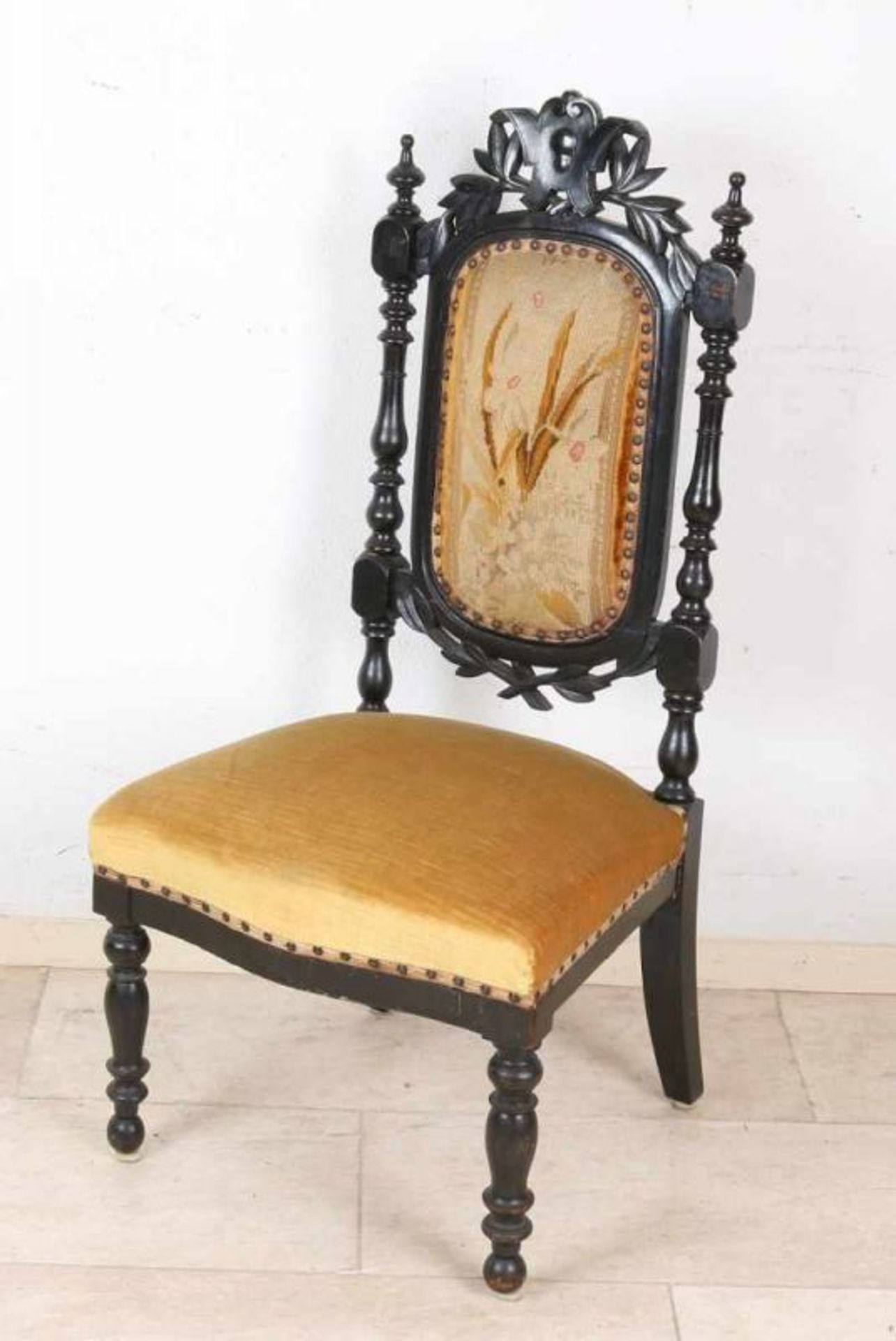 19th century French bonised wood carved knitting chair. Circa 1870. Dimensions: 99 x 40 x 50 cm.