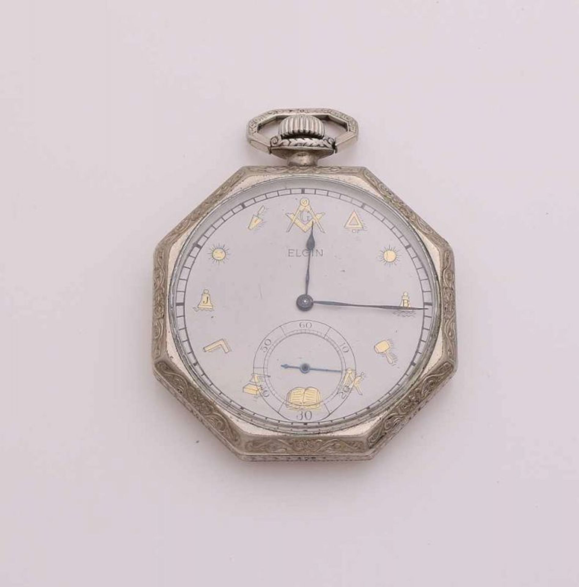 Elgin goldfilled pocket watch, octagonal with a flower-worked border. The dial is decorated with