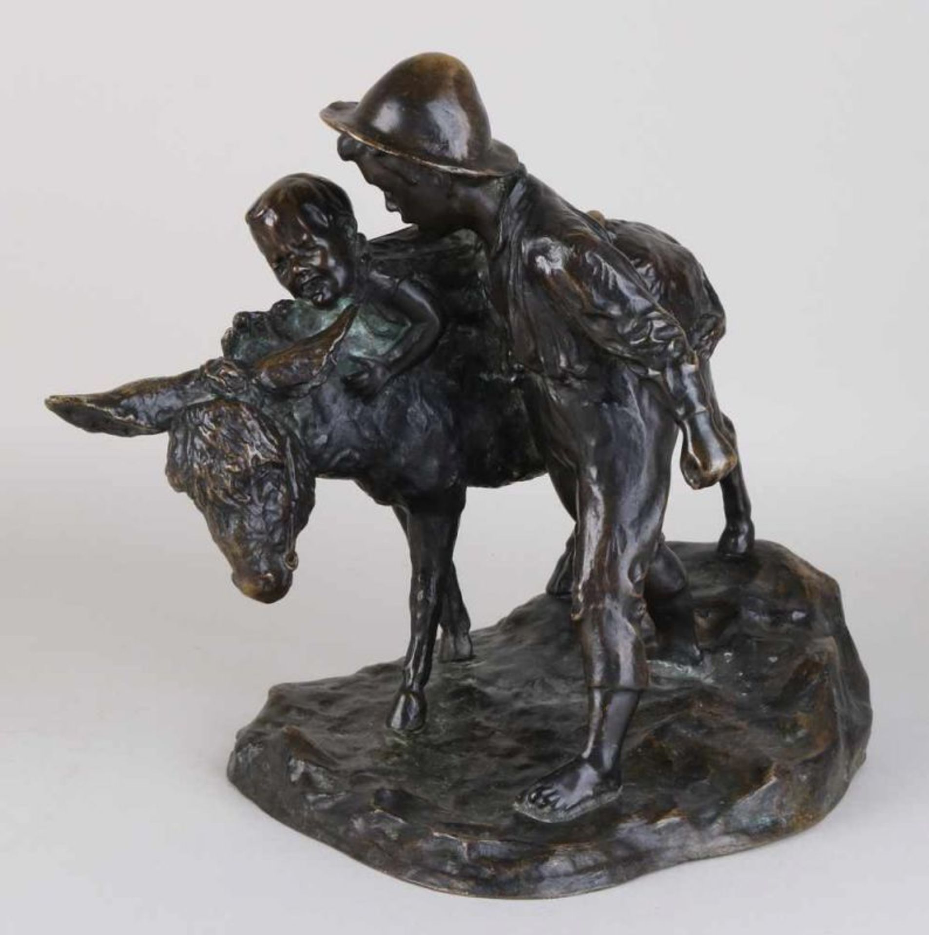 Antique bronze figure. Children with donkey. Circa 1900. Dimensions: 31 x 34 x 20 cm. In good