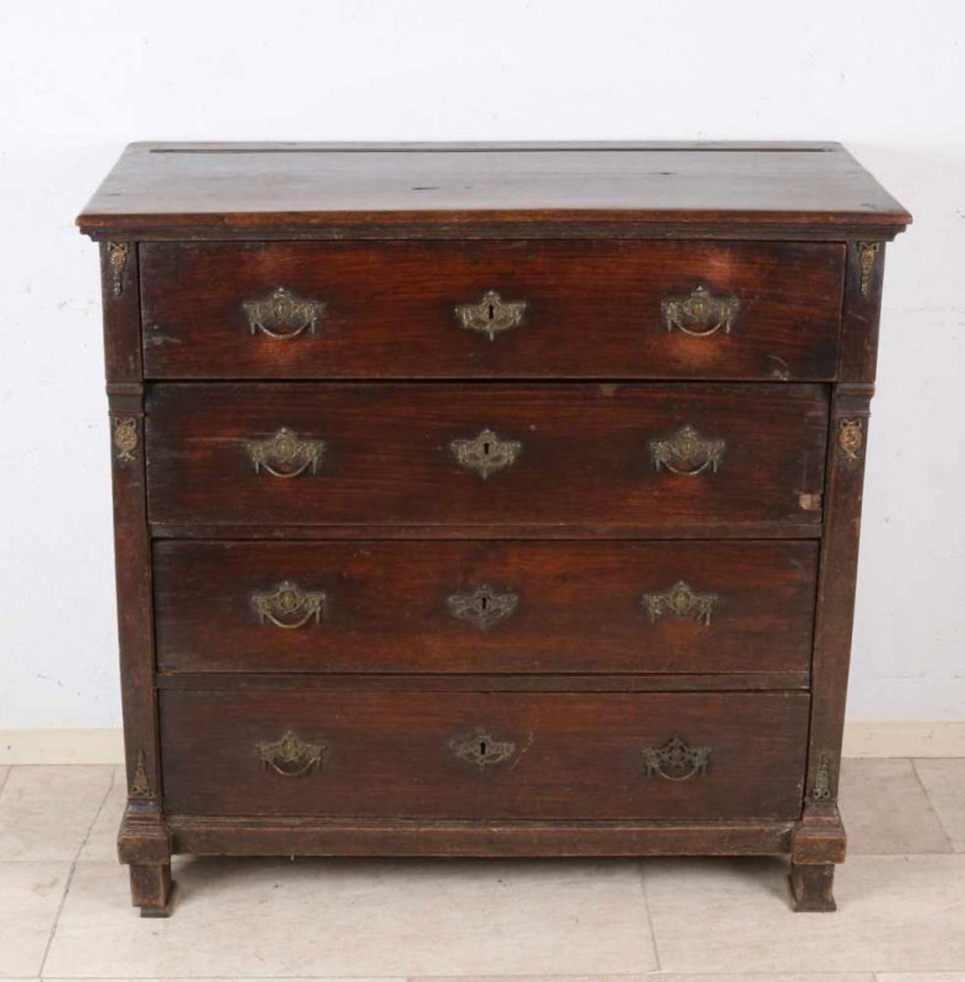 Dutch oak Louis Seize four-drawer chest of drawers with bronze decorations and fittings. Around