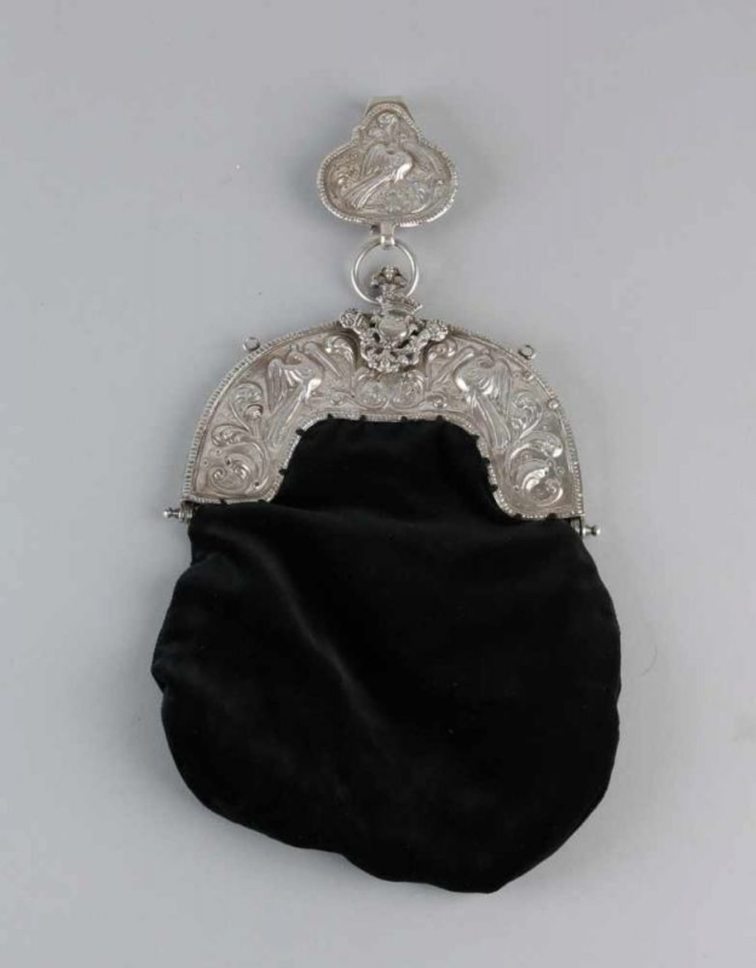 18th century bag with silver bracket and skirt hook, half round bracket decorated with peacocks