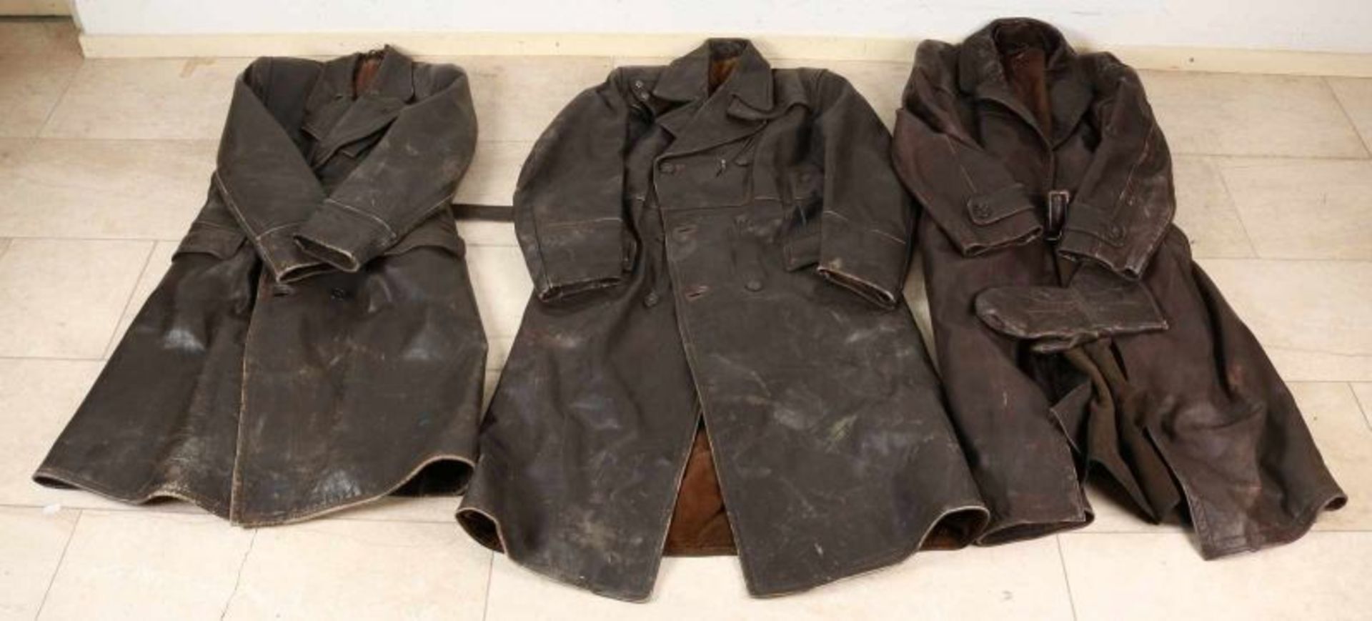 Three old leather motorcycle jackets. Circa 1930 - 1960. 20th Century. Size: Large. Traces of use.